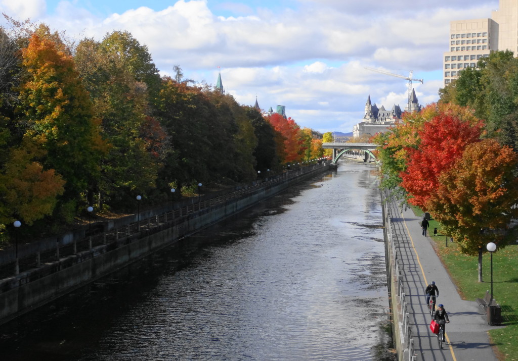 A view from the Corkstown Footbridge of the colourful trees lining the Rideau Canal.