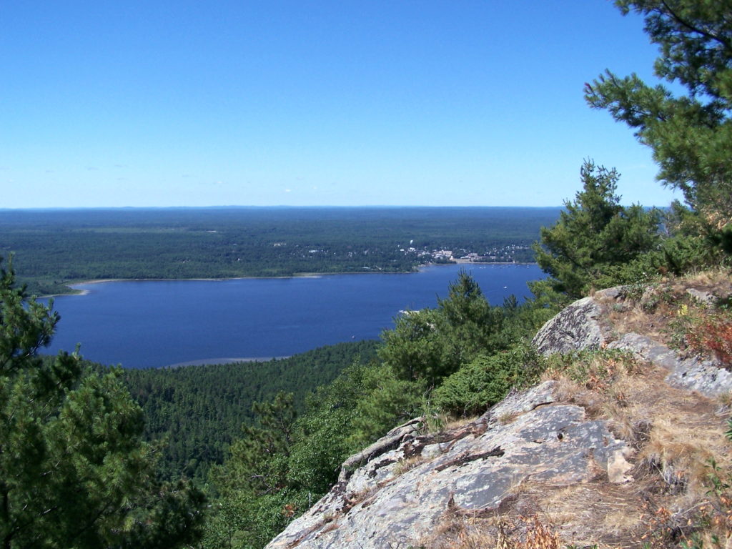 The Ottawa River and Ottawa Valley spread out below the lookout on Mount Martin, Quebec. In the distance, the town of Deep River lies along the far shore.